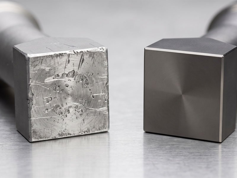 Comparative view of worn aluminum ultrasonic horn versus hardened HRC 45 plus titanium horn for glass-filled plastics